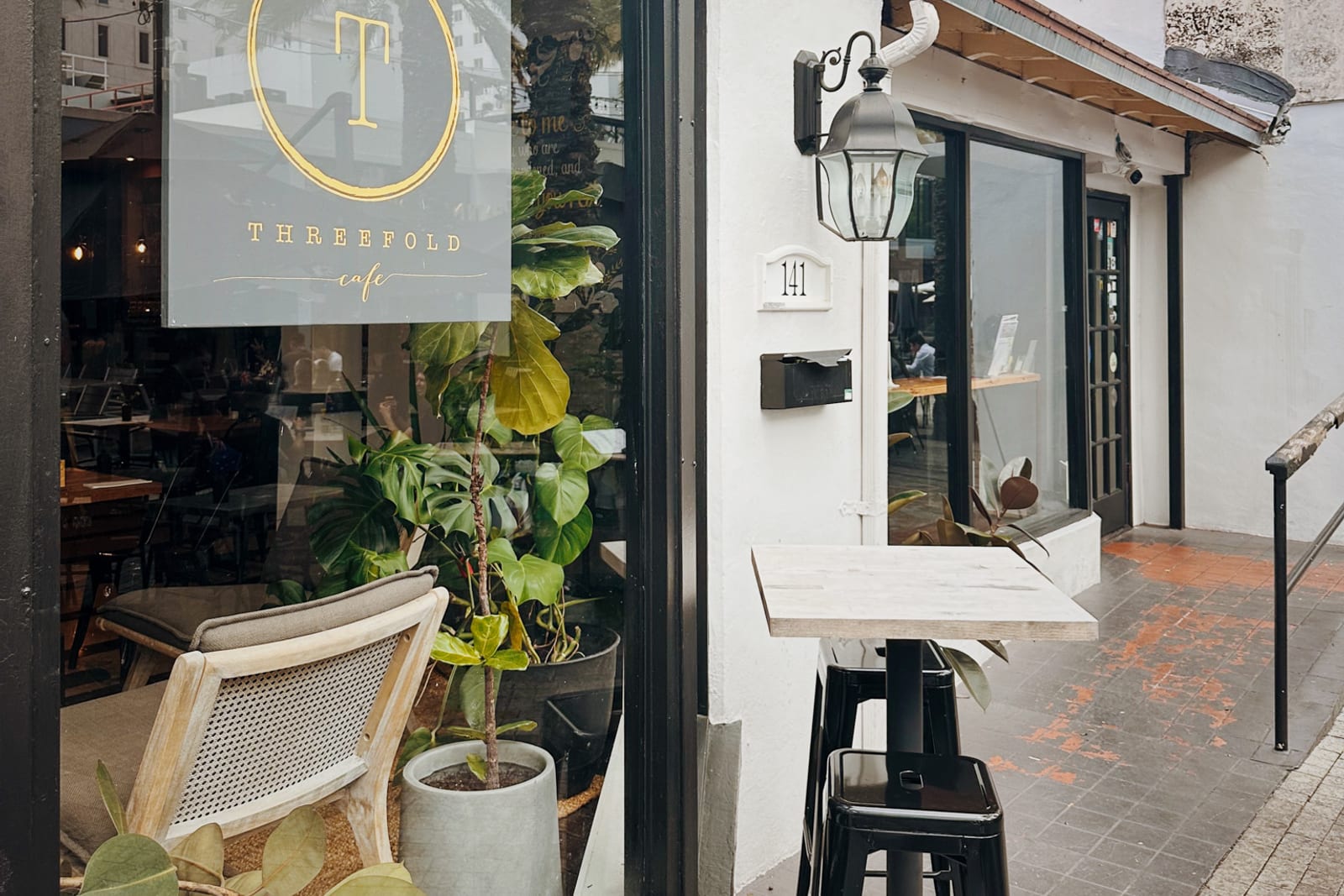 Threefold Cafe storefront on Giralda Avenue in Coral Gables