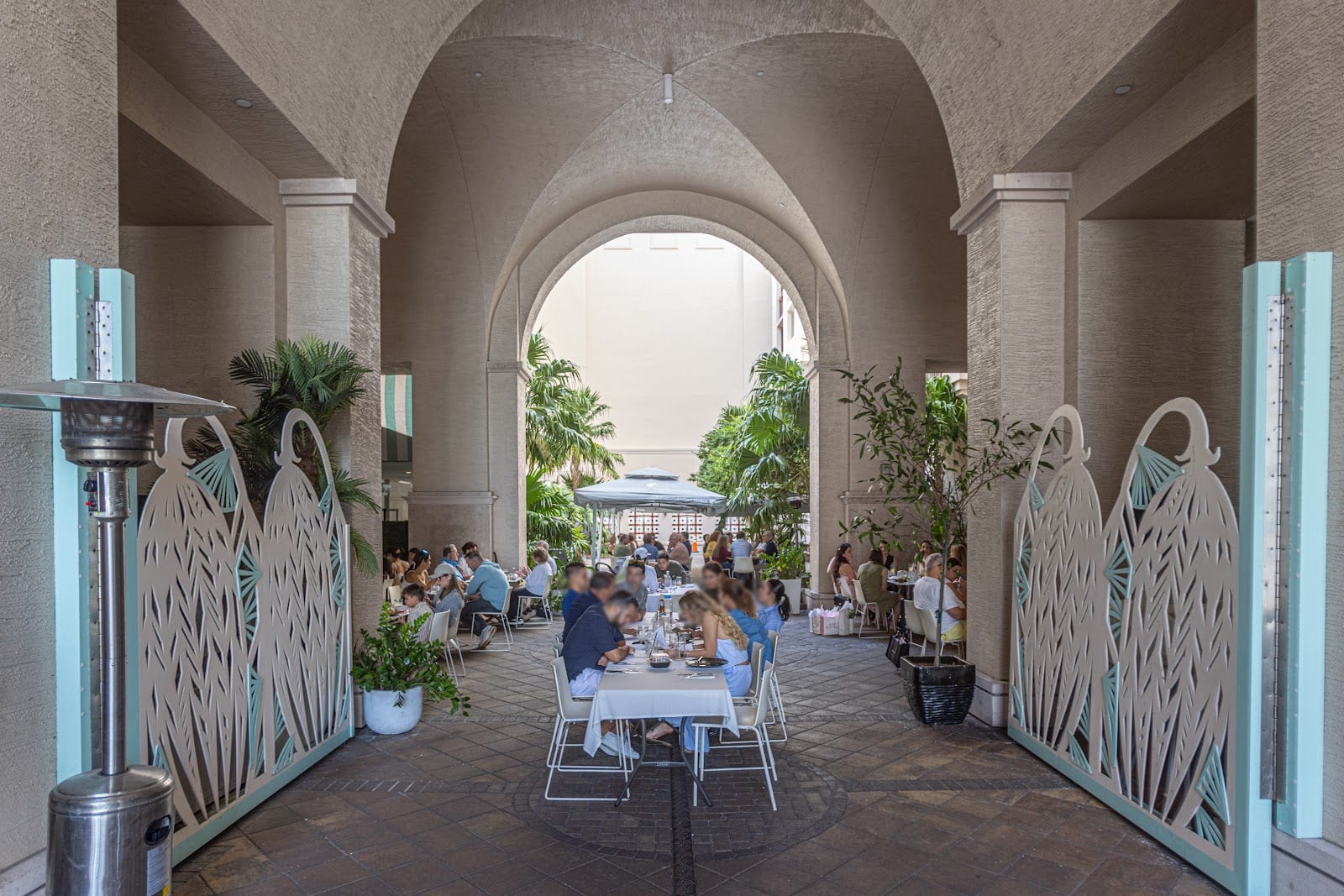 Dining room and courtyard at Bachour bakery and restaurant in Coral Gables