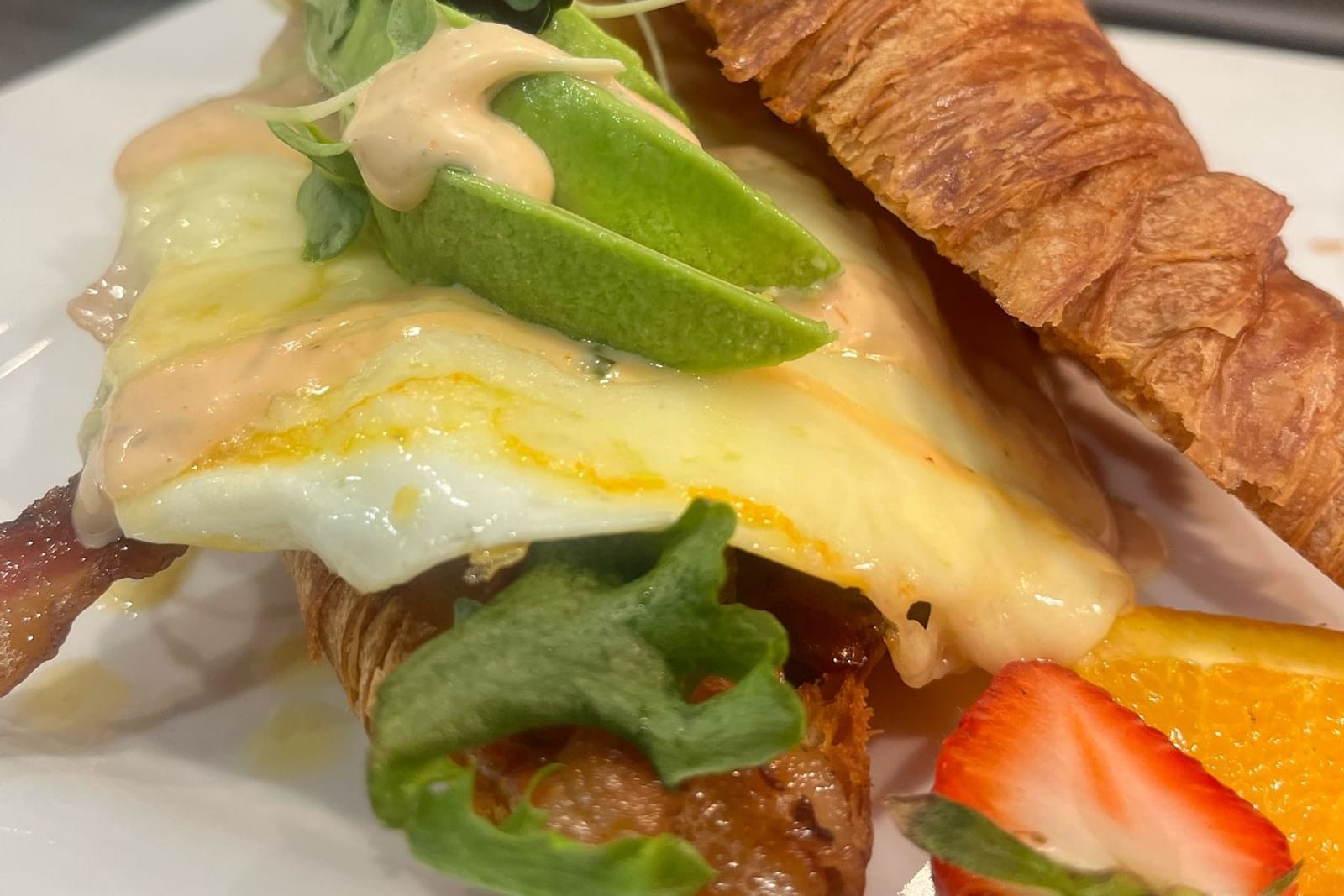 A croissant breakfast sandwich at Birdie Bistro in Coral Gables