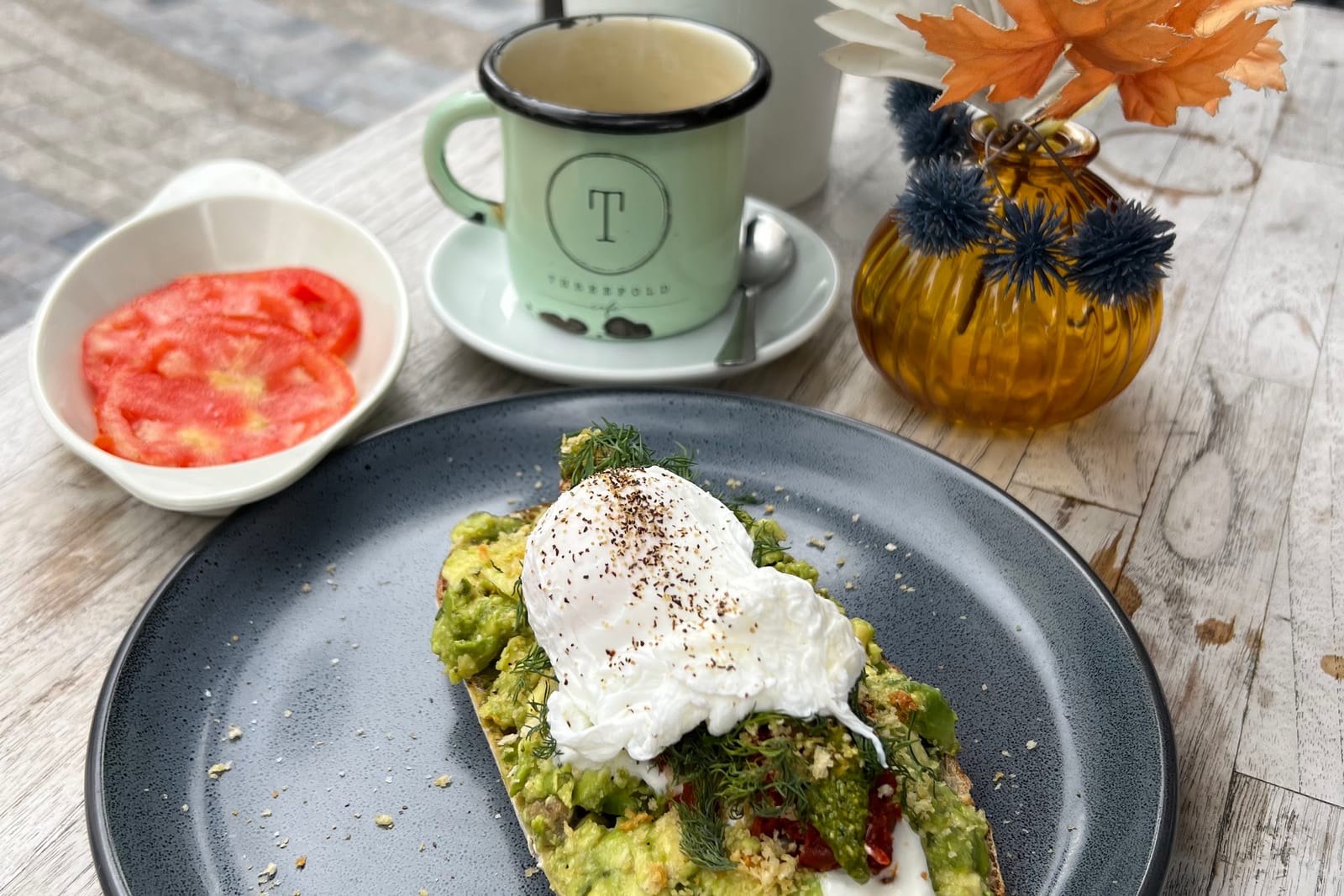 Avocado toast with a poached egg at Threefold Cafe in Coral Gables