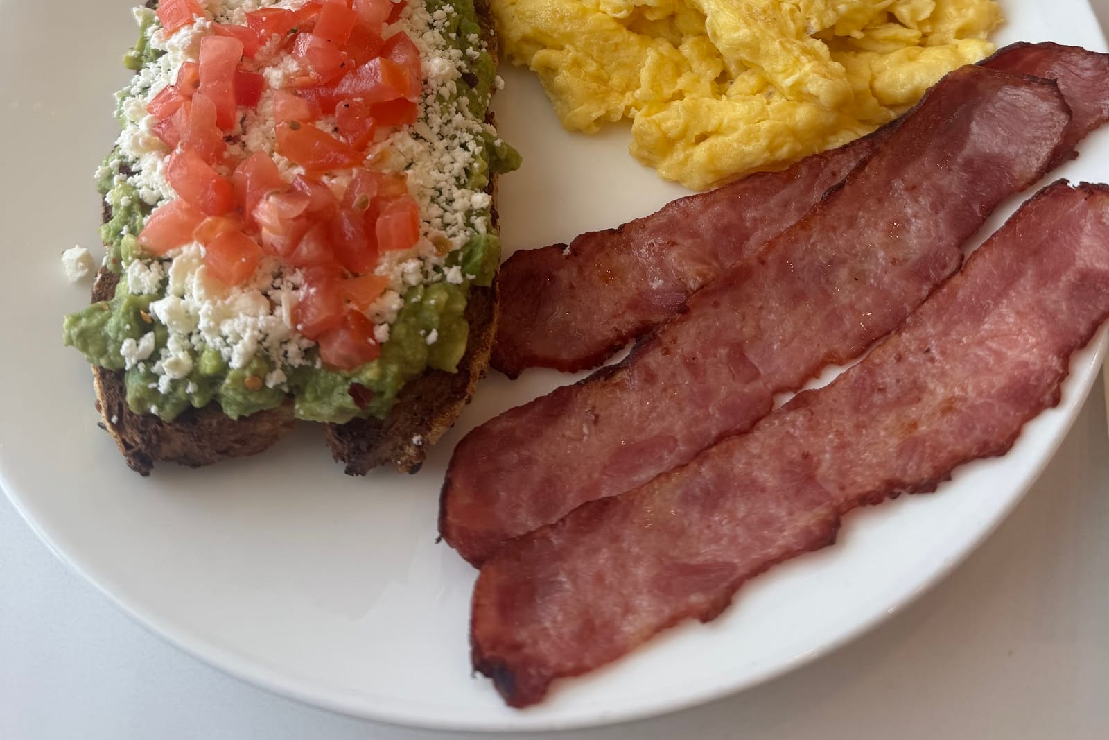Avocado toast with scrambled eggs at Carrot Express on Miracle Mile