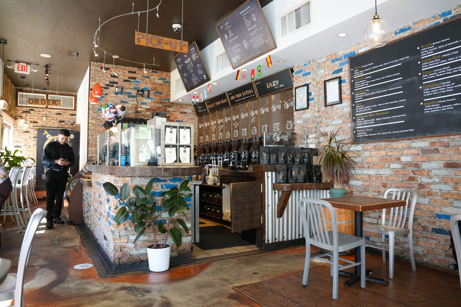 The single origin bean wall and counter inside Pasión del Cielo Coffee on Giralda Ave in Coral Gables